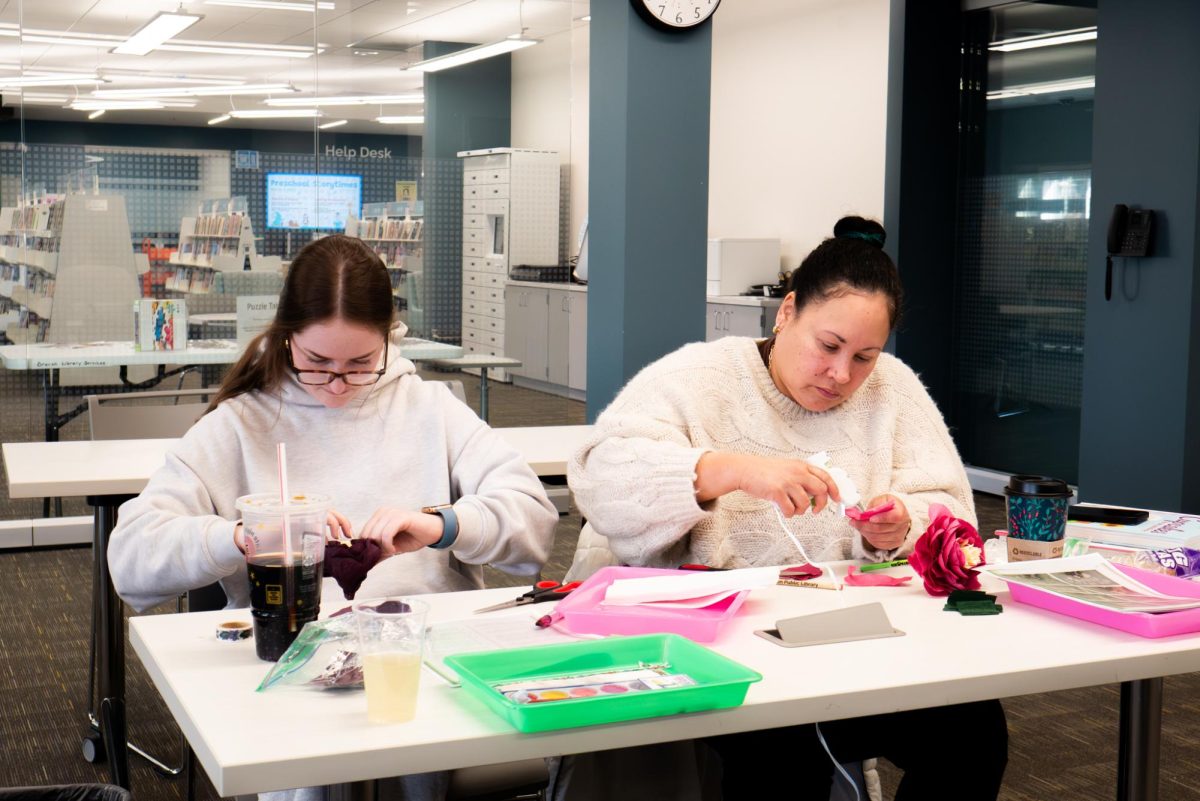 Patrons craft handmade flowers during the Spring Crafting event at Gail Borden Public Library South Elgin Branch on March 12, 2026. “Libraries aren’t just about books anymore,” said Kim Alberth, Branch Customer Relations Manager, “They’re about opportunity.”