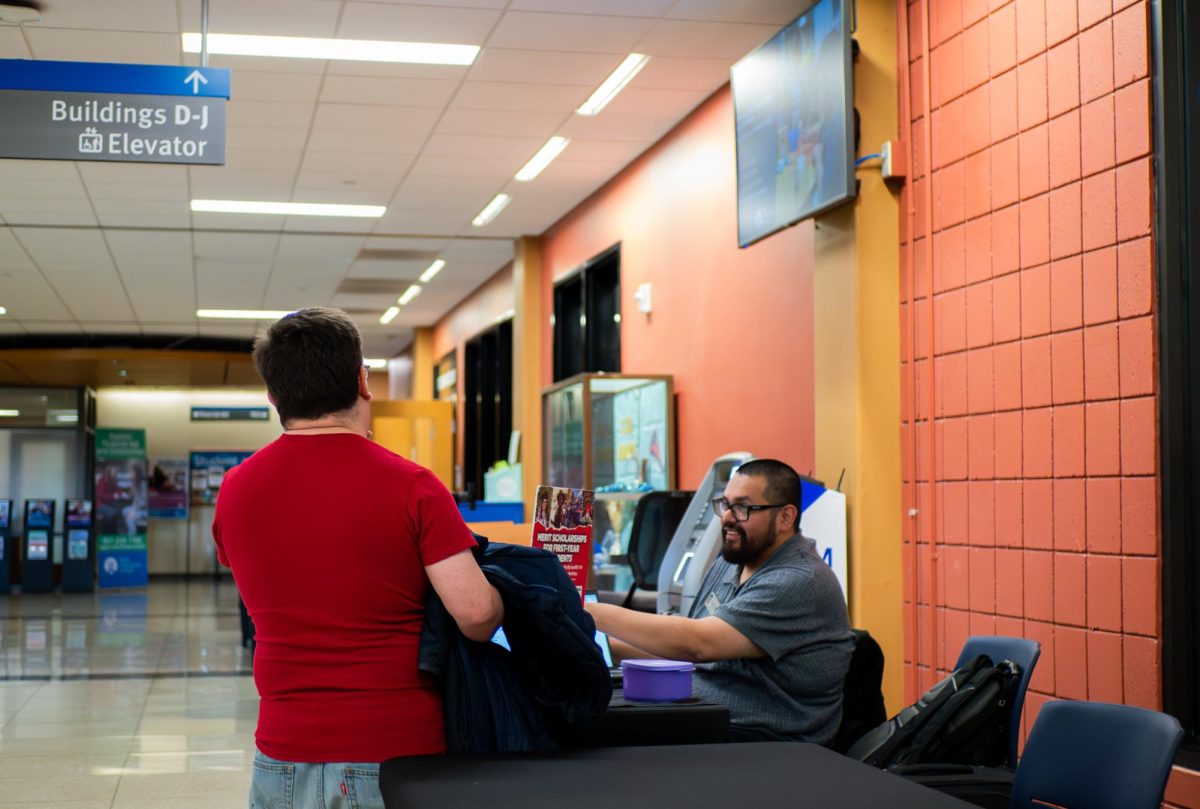 Omar Ramirez, NIU'S admissions counselor, speaks with students at ECC's transfer day on April 6, 2026. Ramirez returned to ECC to discuss opportunities at NIU.