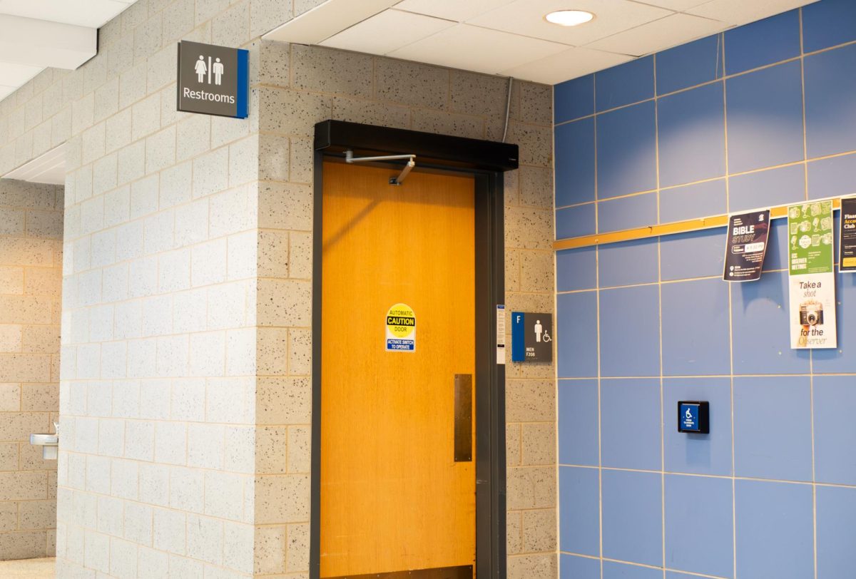 Men's bathroom located on the second floor of Building F at Elgin Community College on May 11, 2026. The campus failed to add a handicap accessible button in the women's bathroom located directly across from the men's.