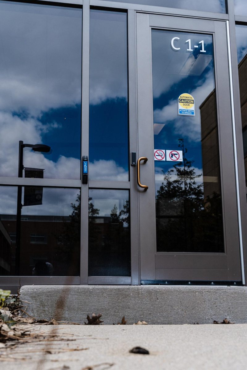 Despite this door having an ADA (Americans with Disabilities Act) button, it leads outside to a step that can endanger wheelchair-bound students, on May 6, 2026. Wheelchair-bound students that use this door can possibly injury themselves or damage their mobility devices if they are unaware of the step.