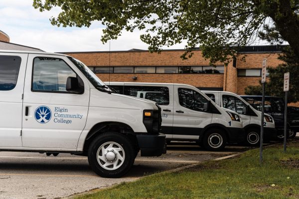 Student life vans, reserved for trips and other uses, are parked outside Building F, on May 6, 2026. Student life only have one wheelchair accessible van out of all the vans available, making trips that need to accommodate a disabled student challenging.