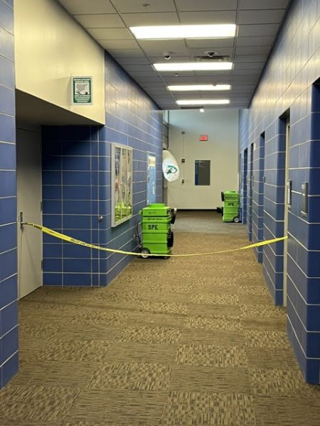 Entrance by Building M closed off with tape due to the men's and women’s bathrooms being flooded by the excess amount of water caused by the water main break incident.
